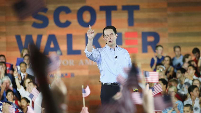 Wisconsin Governor Scott Walker announces to supporters and news media gathered at the Waukesha County Expo Center that he will seek the Republican nomination for president on July 13, 2015 in Waukesha, Wisconsin.