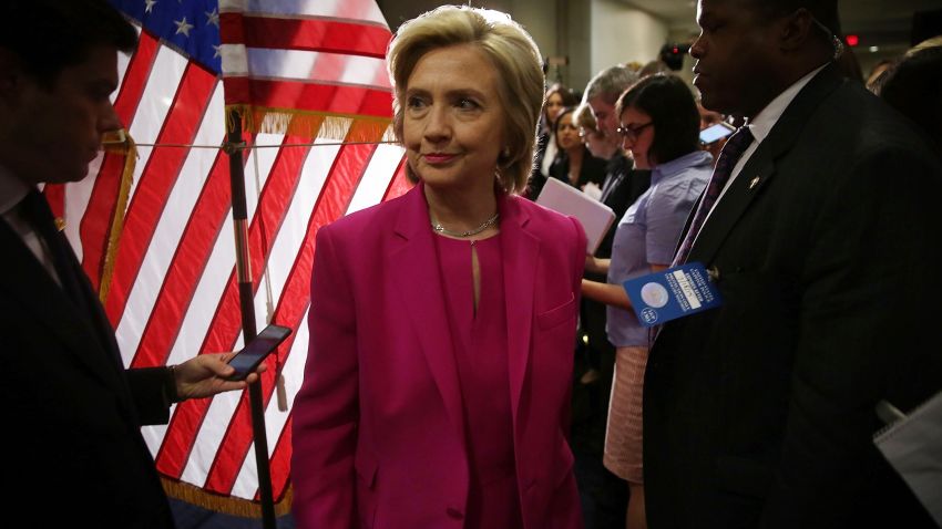 Democratic U.S. presidential hopeful and former U.S. Secretary of State Hillary Clinton leaves the podium after she spoke to members of the media July 14, 2015 on Capitol Hill in Washington, D.C.