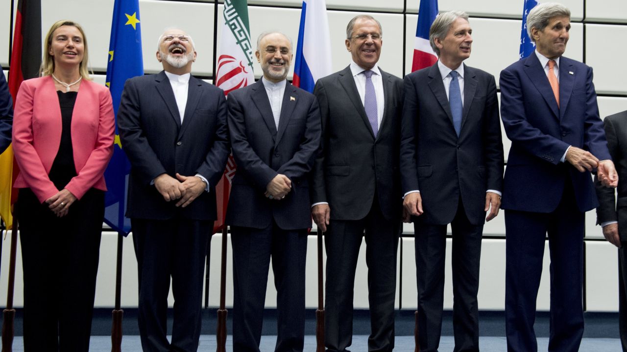 (From L to R) EU policy chief Federica Mogherini, Iranian Foreign Minister Mohammad Javad Zarif, Head of the Iranian Atomic Energy Organization Ali Akbar Salehi, Russian Foreign Minister Sergey Lavrov, British Foreign Secretary Philip Hammond and US Secretary of State John Kerry pose for a group picture at the UN building in Vienna on July 14, 2015. 