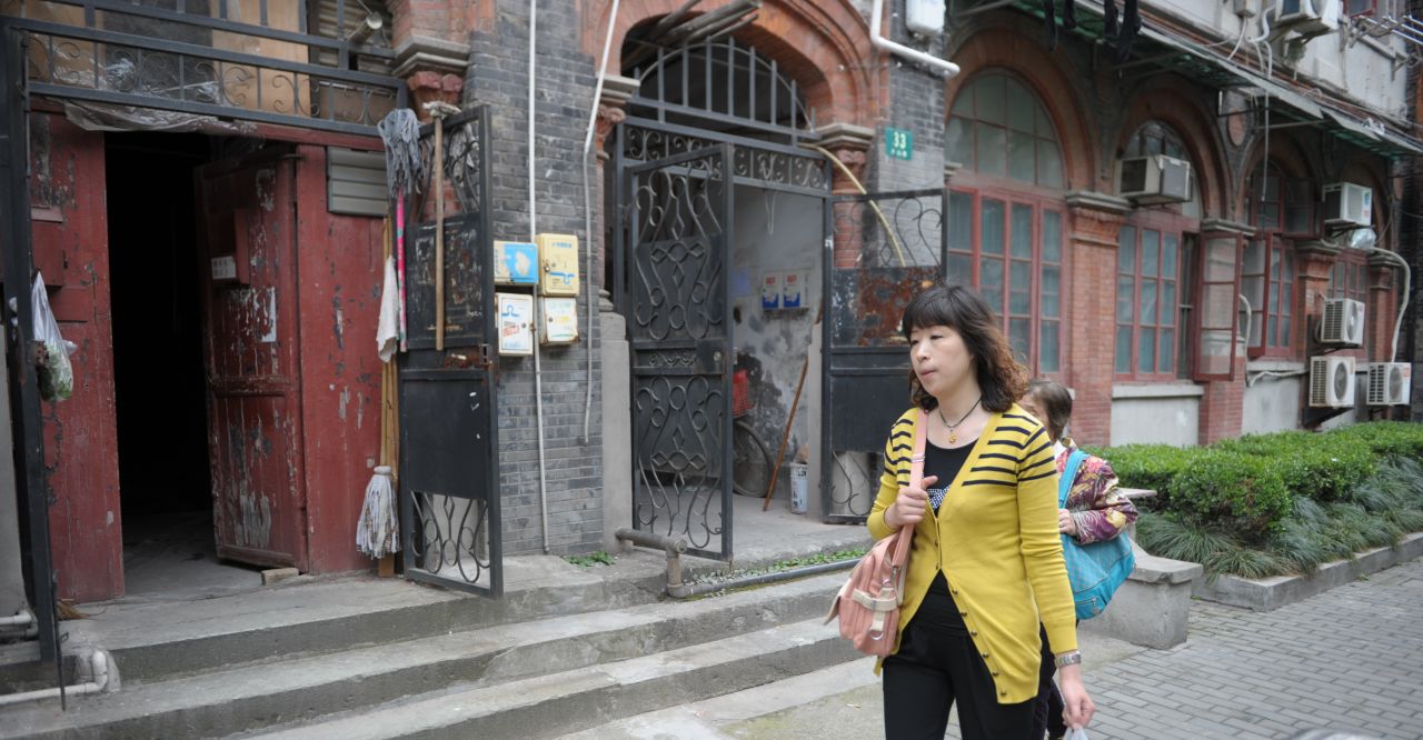 A woman walks through Shanghai's former Jewish ghetto on May 7, 2013. Today, there are few remnants of its Jewish history although organizations like the <a href="http://chrlawyers.hk/en/content/1100-14-july-2015-146-lawyers-law-firm-staffhuman-right-activists-have-been-detainedarrested" target="_blank" target="_blank">Shanghai Jewish Refugees Museum</a> are trying to change this. 
