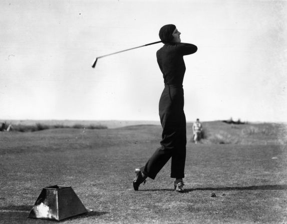 The elegant and striking figure of Gloria Minoprio caused a sensation at the English Ladies' Golf Championship in 1933 when she arrived carrying just one club and wearing trousers -- a <a href="index.php?page=&url=http%3A%2F%2Fwww.scottishgolfhistory.org%2Fearly-womens-golf%2Fiv-womens-golf-the-fashion-pages-%2F" target="_blank" target="_blank">first for a women golfer</a>. <br /><br />"She turned up using a one iron and wore an iconic outfit -- a pair of navy trousers quite high-waisted and well-fitting, a roll-neck sweater and a turban, all matching navy colors," Fleming says.<br /><br />"From that period onwards, more golfing women thought, 'Well, maybe I could wear slightly more interesting fashion choices on the golf course.'"<br /><br /><br /><br /> 