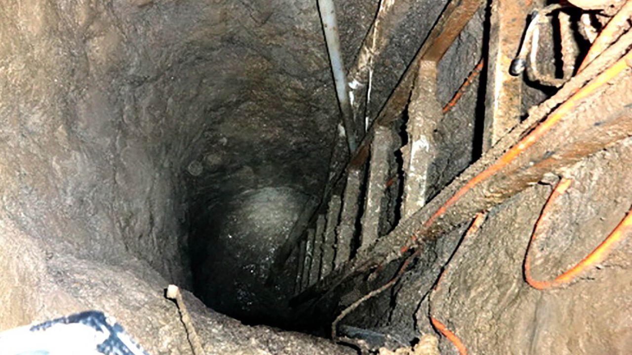 A ladder leads down a hole to El Chapo's escape tunnel.