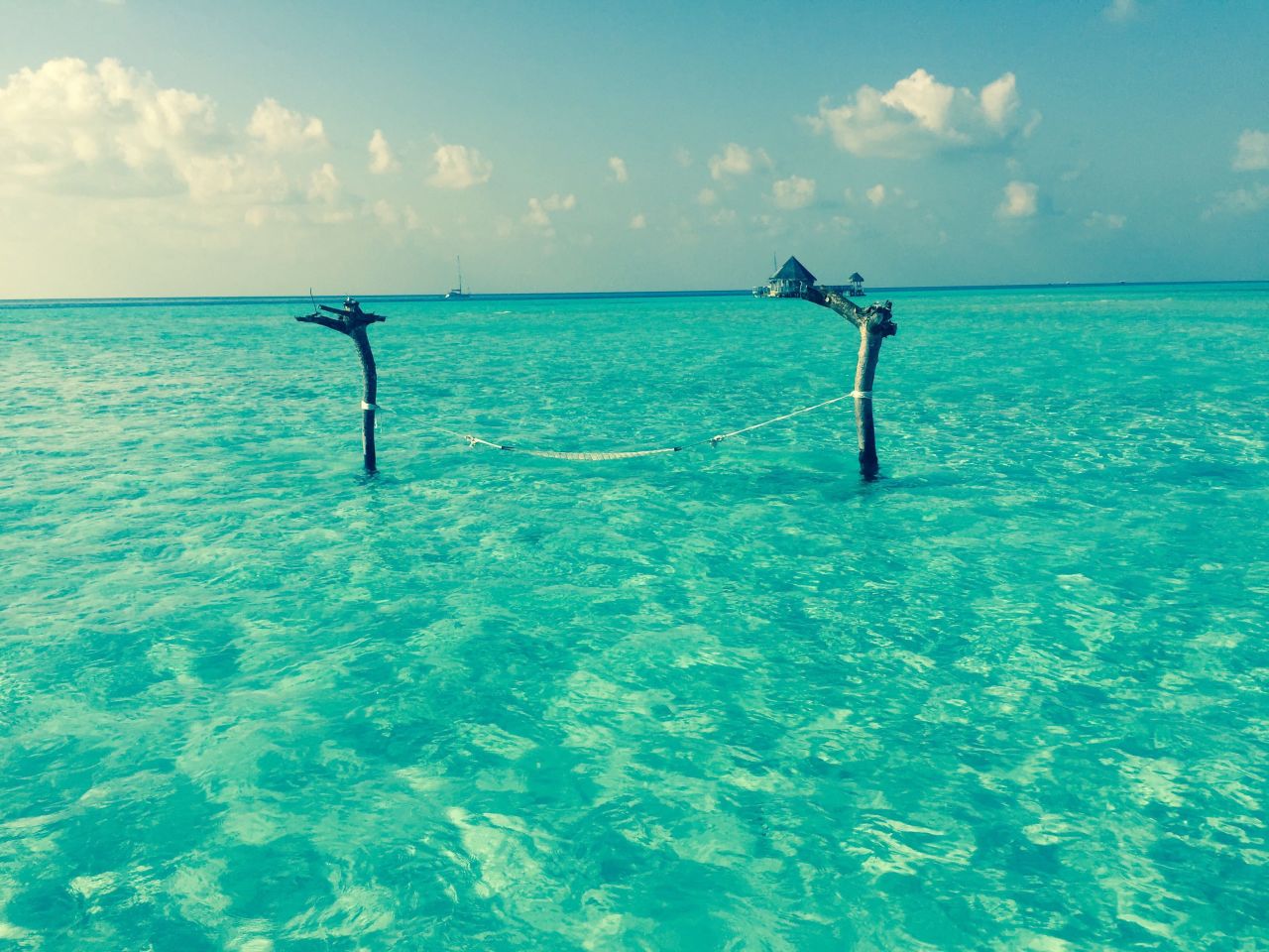 Paradise beckons in the form of a hammock tethered to two pieces of drift wood. "I was taken aback by the clarity and color of the water. It looked as if it were plucked right out of a Photoshopped luxury travel magazine," said <a href="http://ireport.cnn.com/docs/DOC-1226475">Holly Heft. </a>