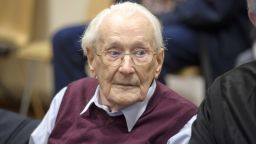 LUNEBURG, GERMANY - JULY 15:  Oskar Groening, 94, a former member of the Waffen-SS who worked at the Auschwitz concentration camp during World War II, awaits the verdict in his trial on July 15, 2015 in Lueneburg, Germany. Groening was accused of complicity in the murder of 300,000 mostly Hungarian Jews at Auschwitz in 1944. He worked as an accountant for the SS at Auschwitz and has admitted moral and personal responsibility for his role there. Groening has been convicted of being an accessory to murder, and sentenced to four years in prison. (Photo by Hans-Jurgen Wege/Getty Images)