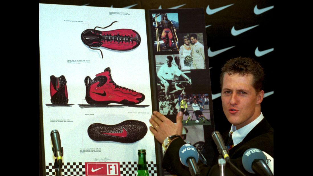 Formula One champion Michael Schumacher presents his new Nike racing shoe in Cologne, Germany, in January 1996. Throughout its history, Nike has signed endorsement deals with some of the biggest names in sports, including Schumacher, Tiger Woods, Roger Federer and LeBron James.