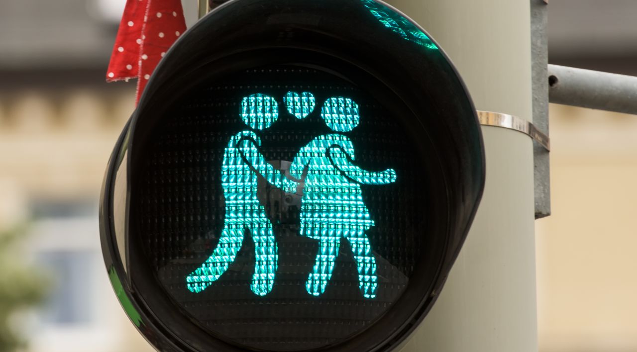Straight people aren't left out of the street love. A pedestrian crossing signal shows a heterosexual couple at a junction in Munich on July 14.
