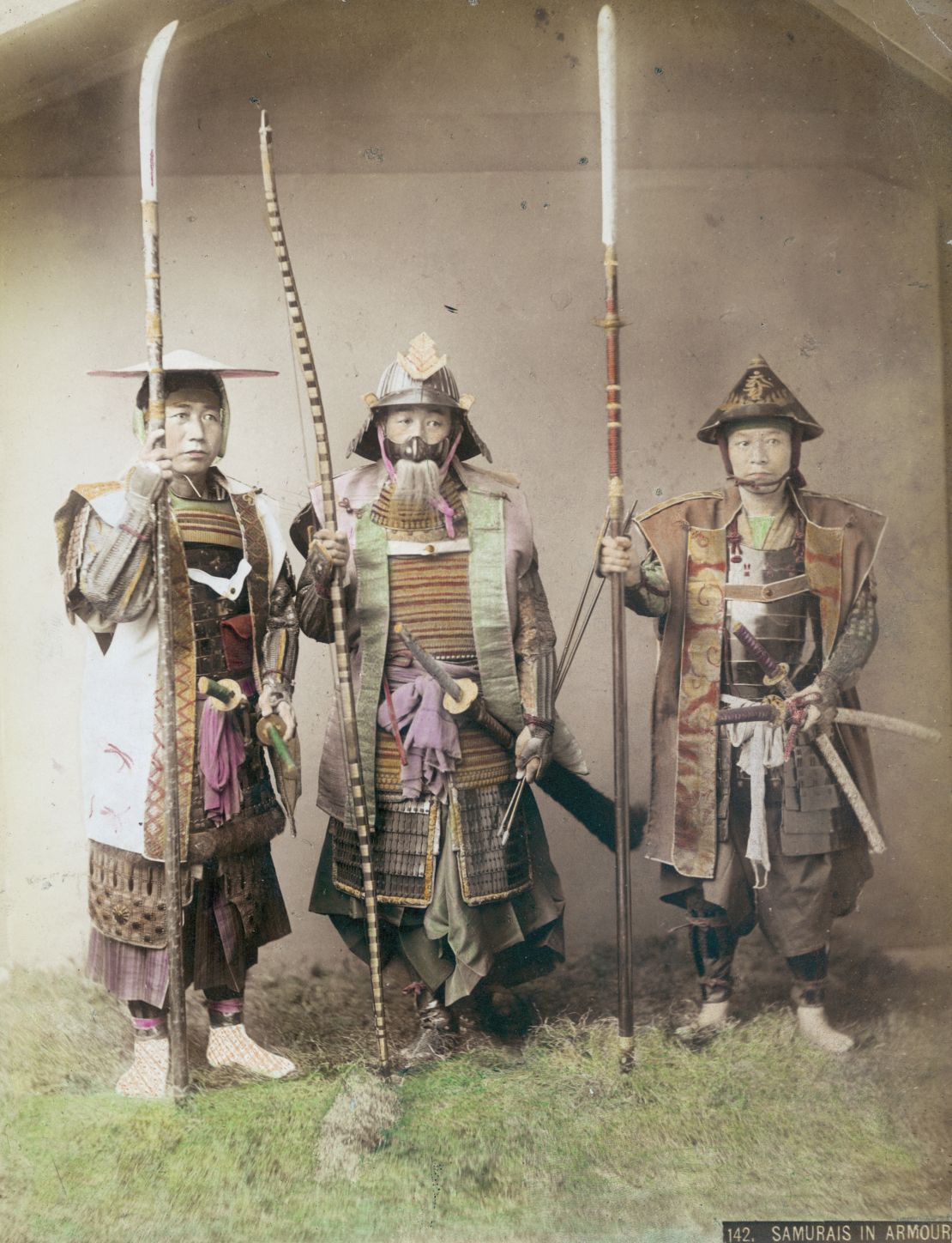 Three samurai warriors in armor, circa 1880.