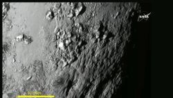 nasa reveals new pluto images_00013818.jpg