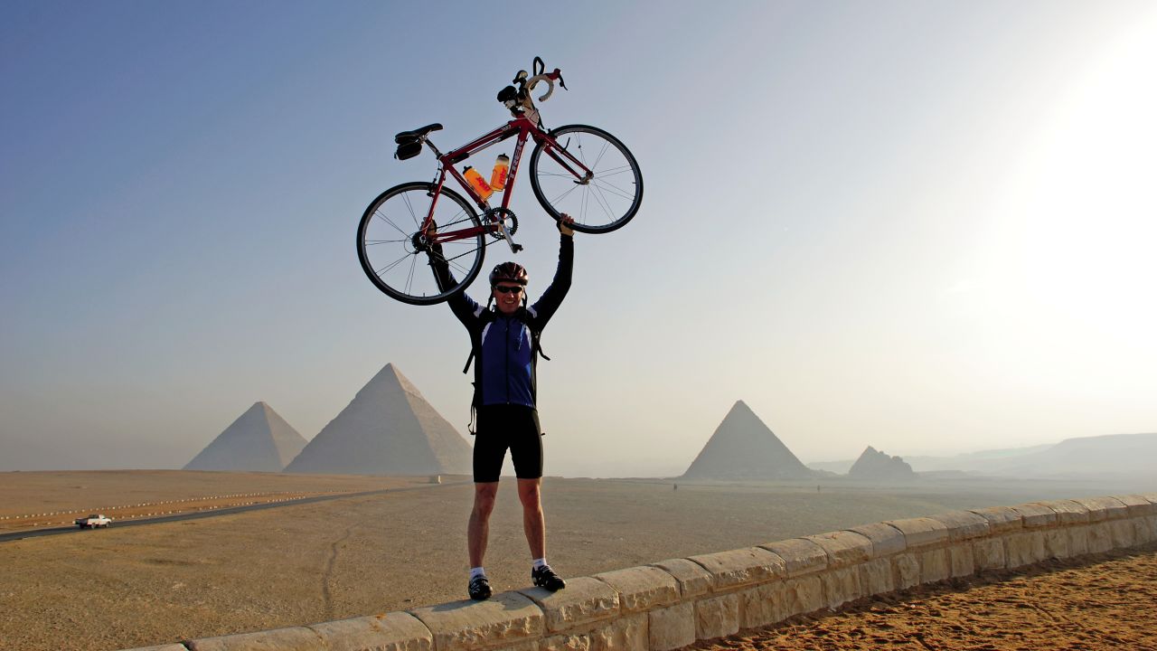 The challenge of nearly 7,500 miles on a bike is what draws riders to the transcontinental Tour d'Afrique. That and, of course, a chance to ride past the Egyptian pyramids, alongside elephants and near the banks of the Nile River. 