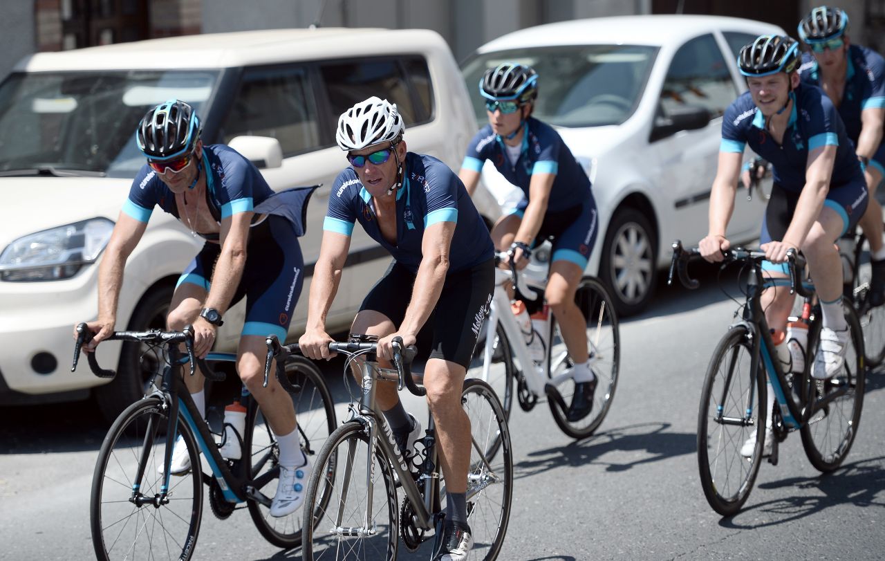 Lance Armstrong cycled a stage of the Tour de France for a leukemia charity, a day ahead of the competing riders. 