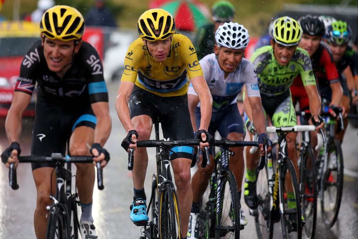 Froome in yellow has his closest rival Quintana of Colombia to his immediate left. Alberto Contador (fourth from left) was unable to back up his Giro d'Italia victory and finished fifth overall. 