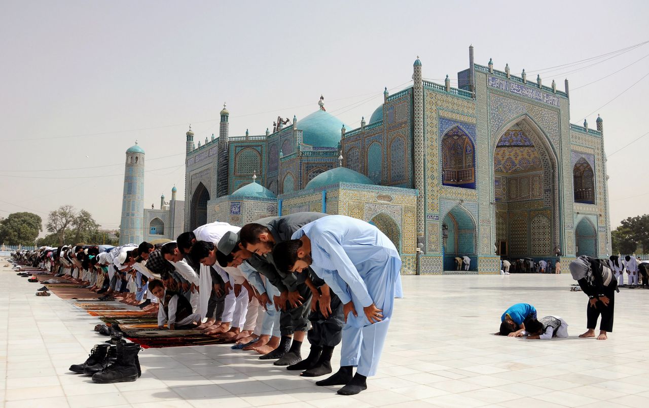Afghan men attend prayers in Mazar-i Sharif, north of Kabul.
