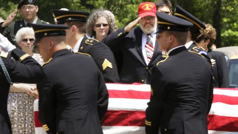 Daris Long salutes the casket of his son.