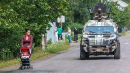 Ukrainian security forces patrol in the village of Bobrovyshche on July 14, 2015.
