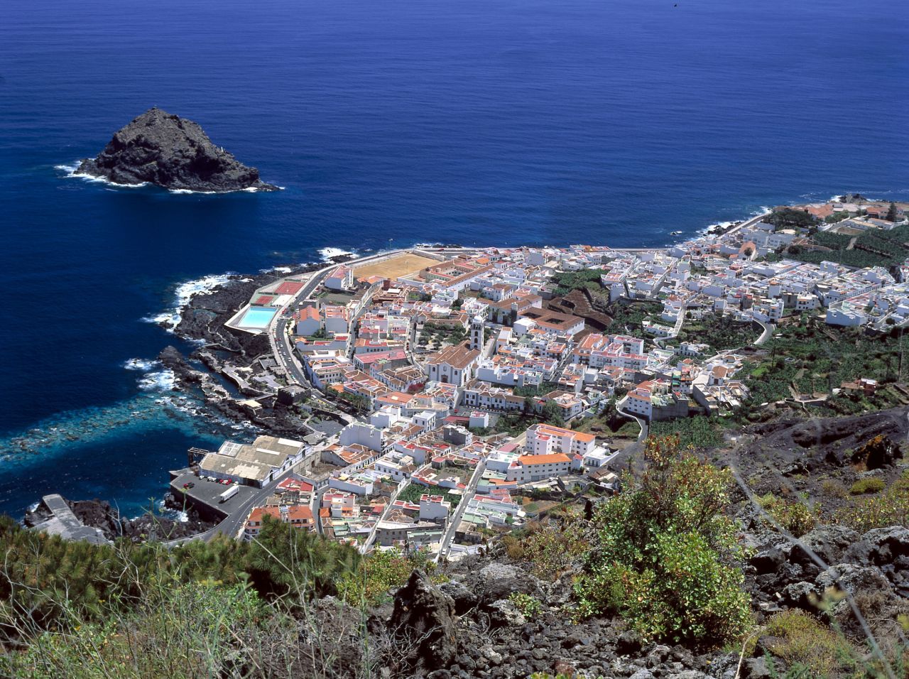 On the southern side of the island, the coastal village of Garachico is home to natural lava rock pools.<br />