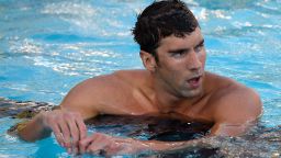 Michael Phelps reacts after his seventh place finish in the Men's 100 Meter Freestyle Final during the 2014 Phillips 66 National Championships at the Woollett Aquatic Center on August 6, 2014 in Irvine, California.
