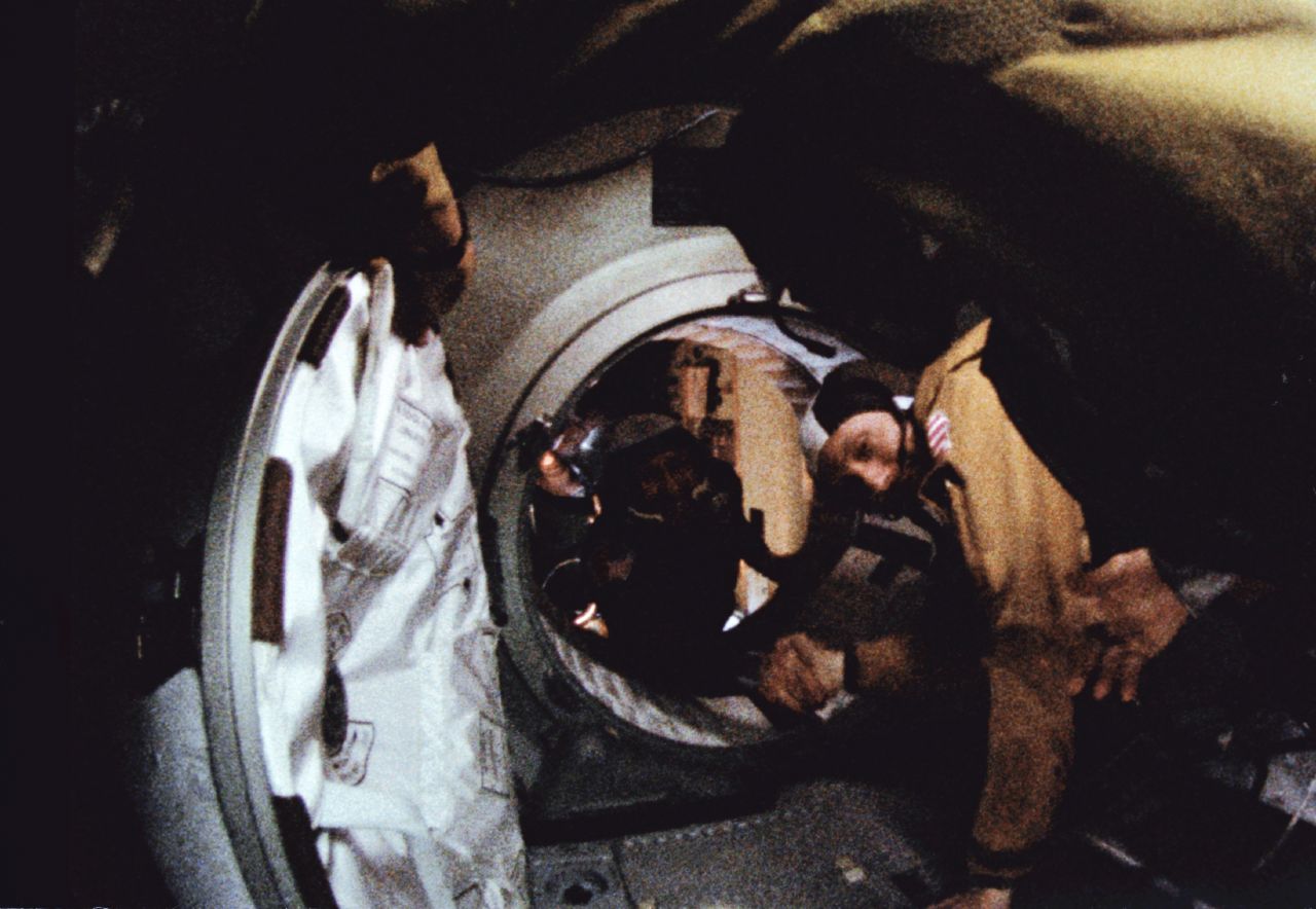 Commander of the Soviet crew of Soyuz, Alexei Leonov, left, and commander of the American crew of Apollo, Thomas Stafford shake hands July 17, 1975 in space, somewhere over Western Germany, after the Apollo-Soyuz docking maneuvers.