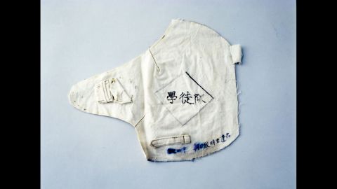 Toshiaki Asahi was a 13-year-old high school student who was working at the time of the attack and wearing this armband. Despite serious burns, he managed to make his way through fires sparked by the bomb. He climbed up a riverbank and escaped to the outskirts of the city. There he was found by an acquaintance and carried home. Three days later, he told family members, "Thank you for all you've done," and died in his mother's lap.