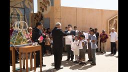 Archbishop José Gomez blessed the handkerchief of immigrant children in the plaza of the Cathedral of Our Lady of Angeles in  Los Angeles in 2014.