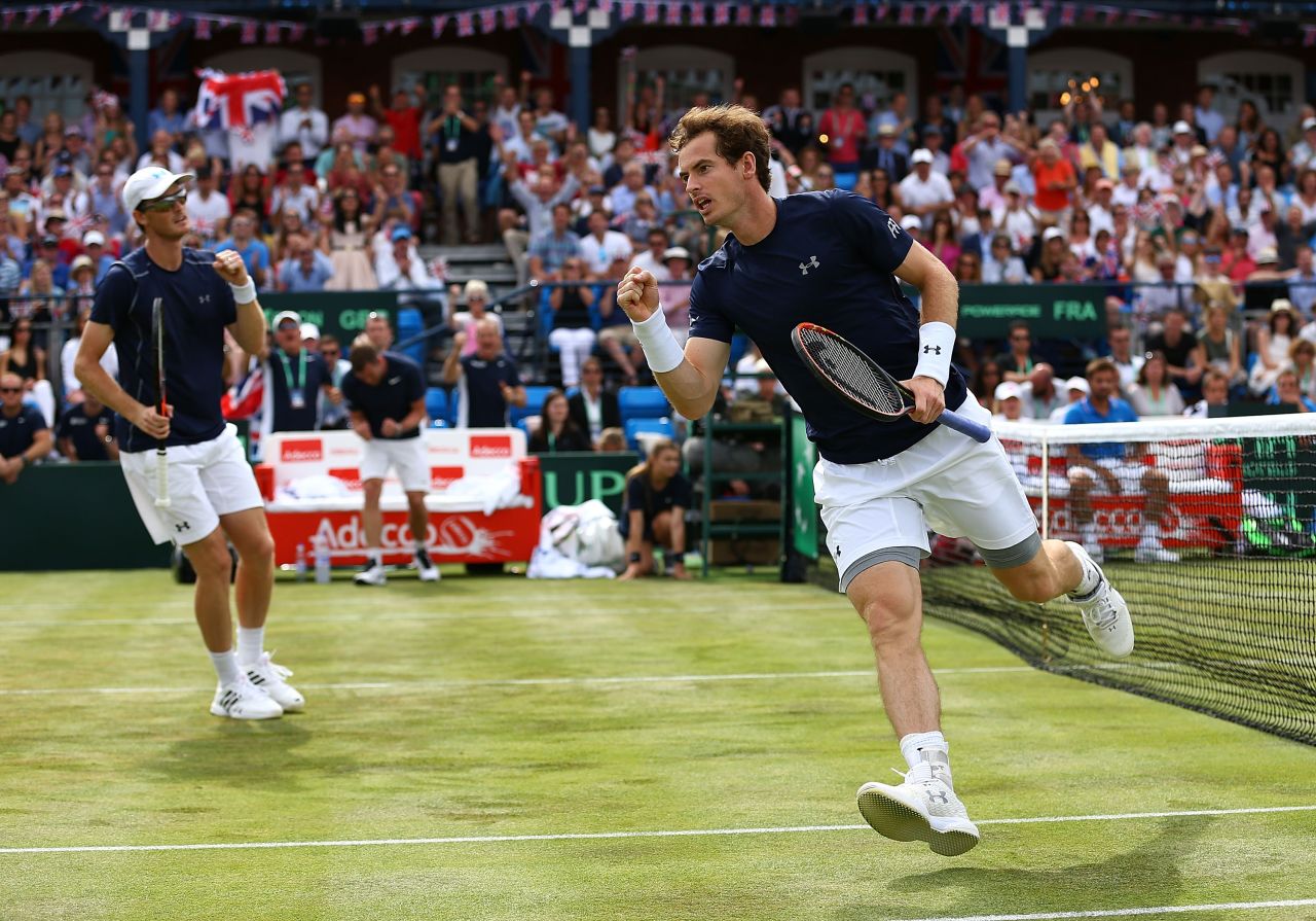 Jamie Murray (left) and Andy Murray (right) celebrate after giving Great Britain a 2-1 lead in the Davis Cup quarterfinal against France. 