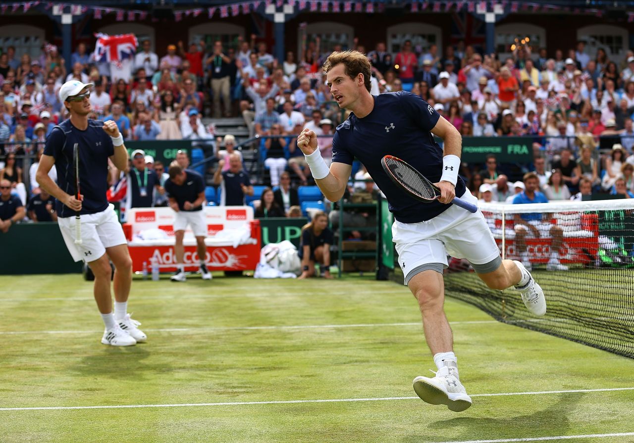 Jamie Murray (left) and Andy Murray (right) celebrate after giving Great Britain a 2-1 lead in the Davis Cup quarterfinal against France.