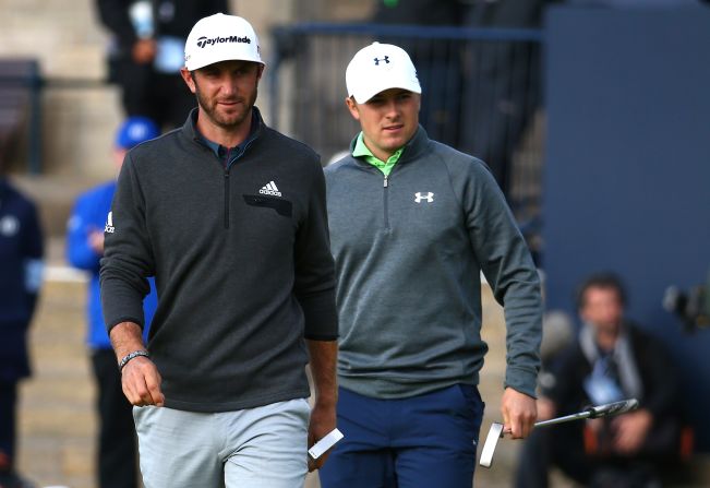 Spieth was tied for 14th at the halfway stage, five shots behind Johnson (left).