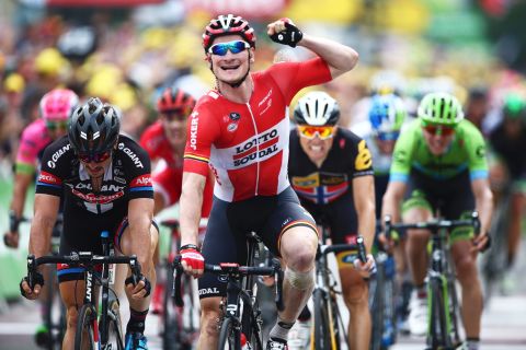 Greipel celebrates his hat-trick of stage wins on the 2015 Tour de France and rounded off the Tour with his fourth on the Champs Elysees.