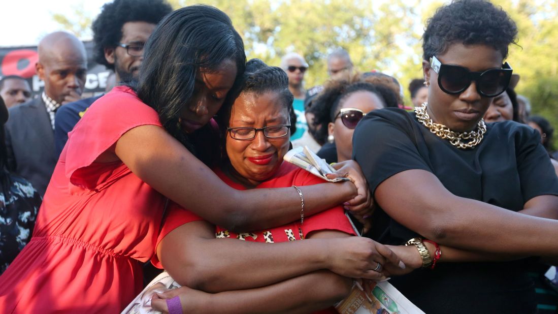 Lanitra Dean hugs Bland's friend Carlesha Harrison during the Prairie View vigil on July 19. Bland had been arrested by the Texas Department of Public Safety, which said she became "argumentative and uncooperative" during a traffic stop.