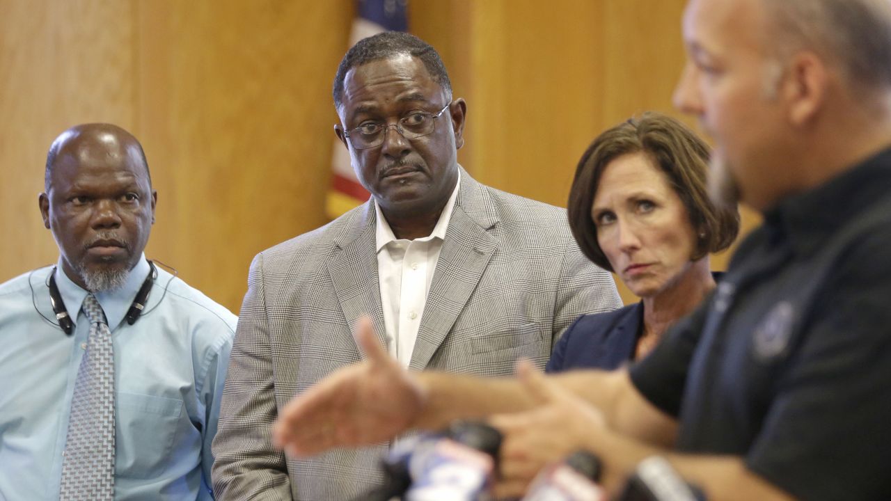 From left, Hempstead Mayor Michael Wolfe, Prairie View Mayor Frank Jackson and Texas state Sen. Lois Kolkhorst listen as Waller County District Attorney Elton Mathis, right, speaks to the media in Hempstead on July 17. "The death of Sandra Bland will not be swept under the rug," Mathis said. The Texas Rangers and the FBI are investigating her death. 