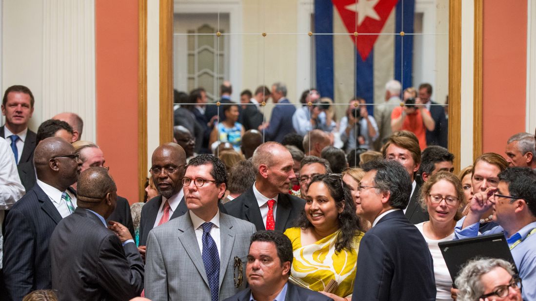 Visitors mingle in the newly reopened Cuban embassy in Washington.