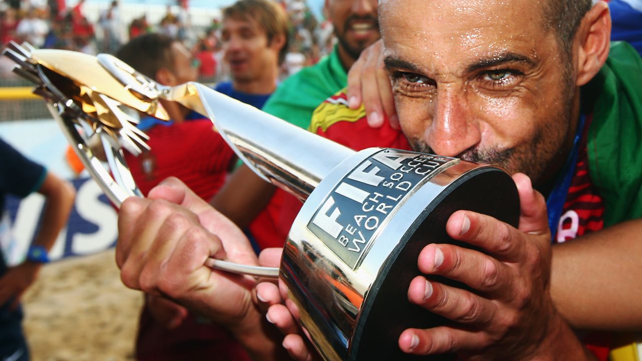 Portugal's Madjer kisses the trophy after his country won the Beach Soccer World Cup on Sunday, July 19. Portugal defeated Tahiti 5-3 in the final, which took place in the Portuguese city of Espinho.