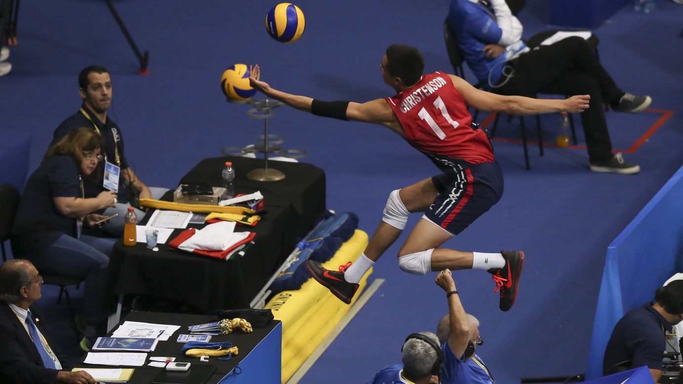 U.S. volleyball player Micah Christenson leaps outside the court for a return while playing Brazil at the World League Tournament on Thursday, July 16. Brazil won the match in Rio de Janeiro, but it was the United States who would eventually advance to the tournament semifinals and finish in third place.
