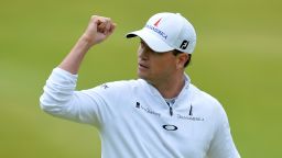 US golfer Zach Johnson celebrates making his birdie putt on the 18th green during his final round 66, on day five of the 2015 British Open Golf Championship on The Old Course at St Andrews in Scotland, on July 20, 2015. The weather-affected championship, finishes on Monday for only the second time in 155 years.