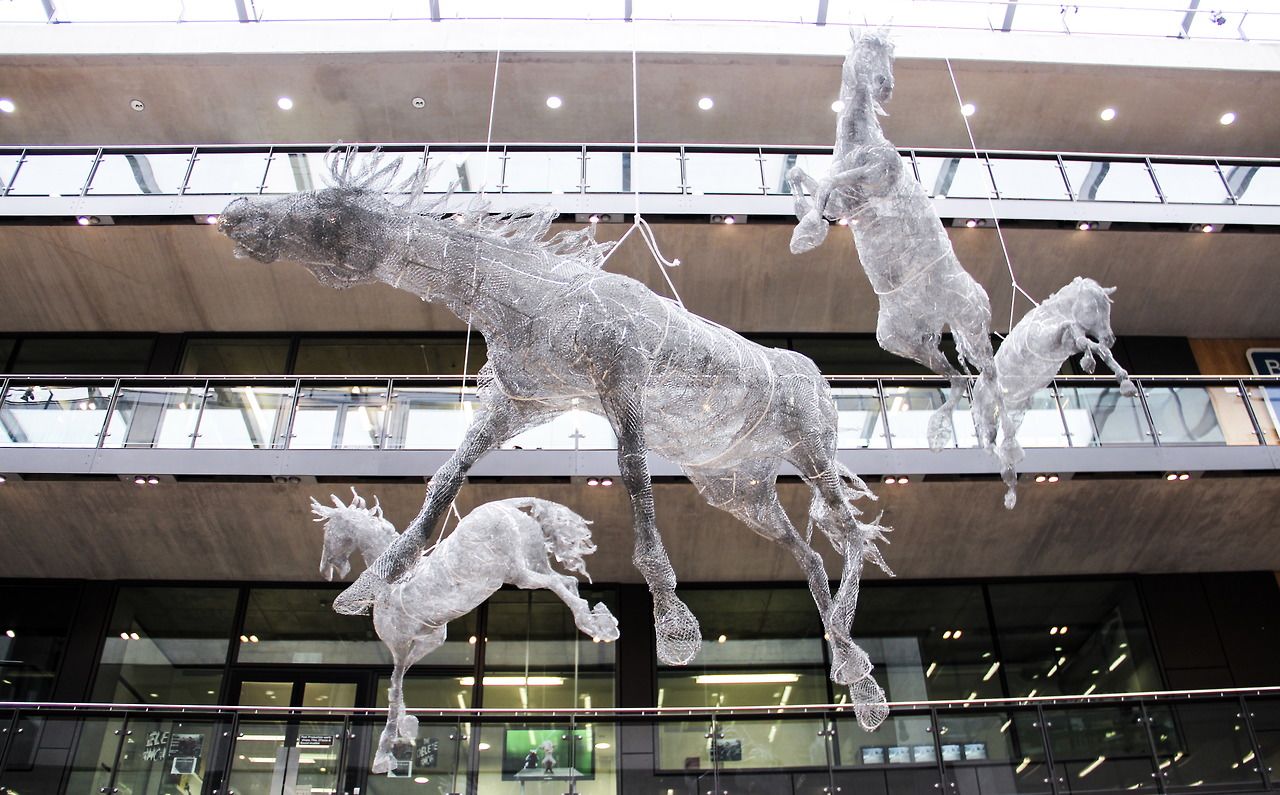 Tess Dumon's life-size horse sculptures were suspended from the ceiling in the atrium at London's Central St. Martins art school.  