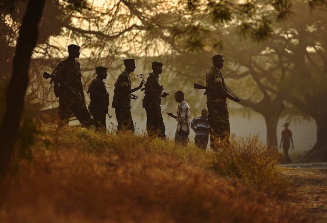 Soldiers guard a polling station in Bujumbura on July 21.