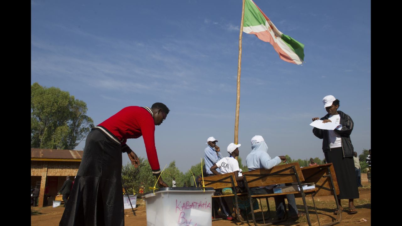 A woman casts her ballot at a polling station in Buye on July 21.
