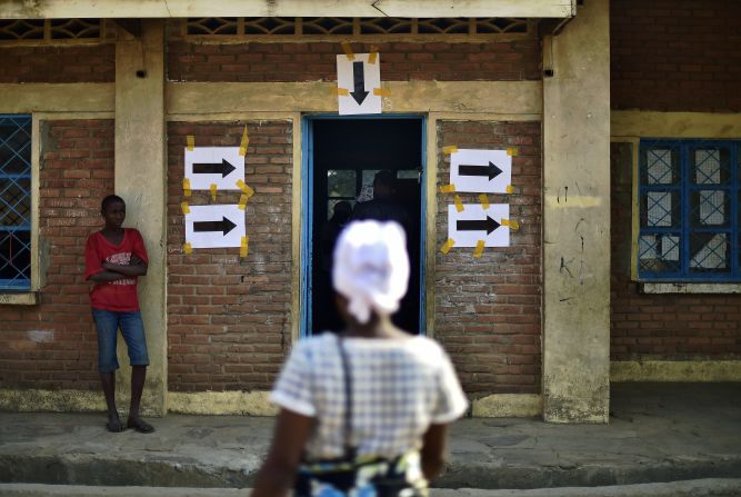 A woman arrives at a polling station in Bujumbura on July 21.