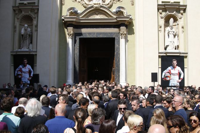 A large crowd gathered to pay tribute to the Marussia driver, who died following the effects of head injuries sustained in a crash in rainy conditions at the 2014 Japanese Grand Prix.