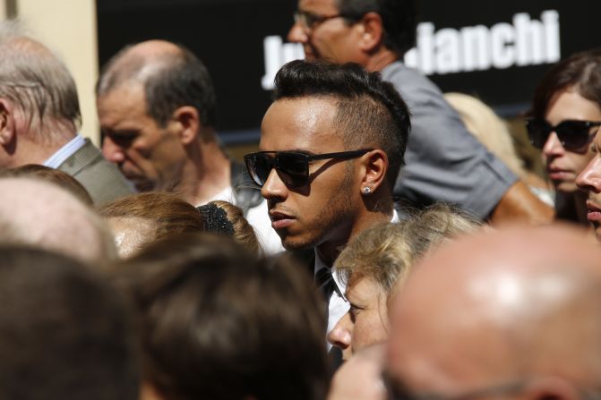 World champion Lewis Hamilton was one of many drivers who attended the funeral of their popular racing peer.