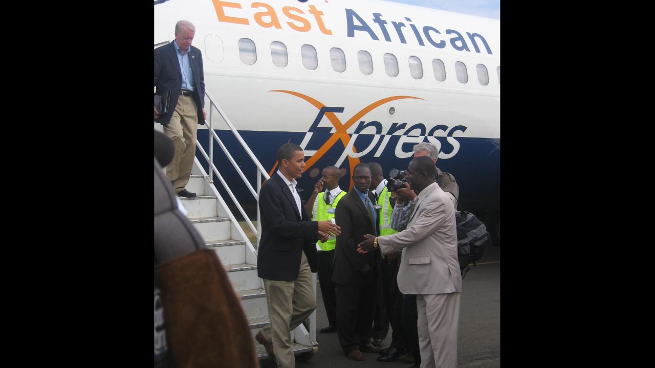 Arriving on East African Express Airlines, Obama stepped off to far less fanfare than when he will later descend the steps of Air Force One.