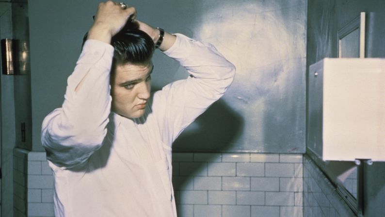 Elvis' hair was naturally sandy blond, but <a href="index.php?page=&url=https%3A%2F%2Fwww.yahoo.com%2Fbeauty%2Felvis-presleys-hairstylist-spills-the-kings-secrets-88493562508.html" target="_blank" target="_blank">he liked to dye it black</a> -- good for the image -- and keep it slicked back. His pompadour was a popular style in the 1950s.
