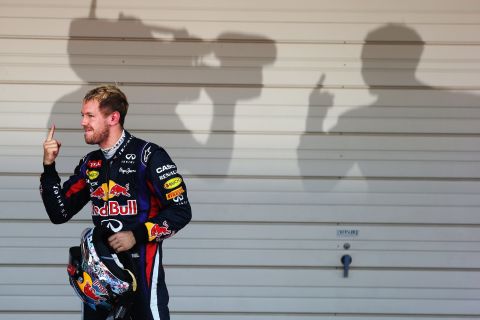 Capturing a quirky picture of a driver can be difficult but here Thompson snaps Sebastian Vettel and his shadow celebrating victory at the Japanese Grand Prix in 2013.