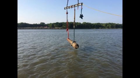 This cannon that was on a Confederate ironclad in Savannah, Georgia, was above the surface for the first time in 150 years on Tuesday, July 21, 2015. It was being raised along with other artifacts as part of a channel deepening project.