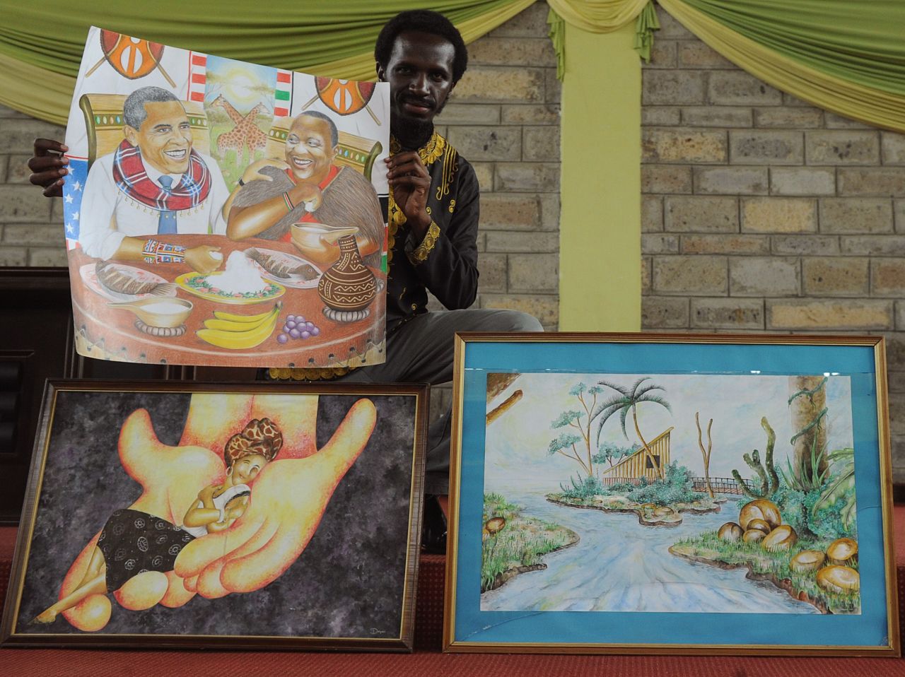 Kenyan artist Dayan Masinde shows several of his artworks including one depicting Obama next to Kenyan President Uhuru Kenyatta, sharing a Kenyan dish.