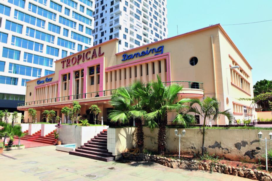 Cine-Bar Tropical in Luanda, Provincia Luanda. Both the date and architect of this city-center Art Deco style cinema are unknown. It is now called the Cine-Bar Tropical Dancing.