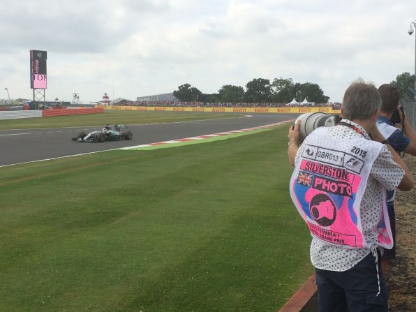 Here he is seen capturing Lewis Hamilton as he thunders through Silverstone's Luffield corner at the 2015 British Grand Prix. He manually focuses all of his shots -- like the previous one of Hamilton driving at the 2014 Russian Grand Prix -- and only uses auto-focus to help capture major incidents, such as crashes, which demand photos are taken quickly.