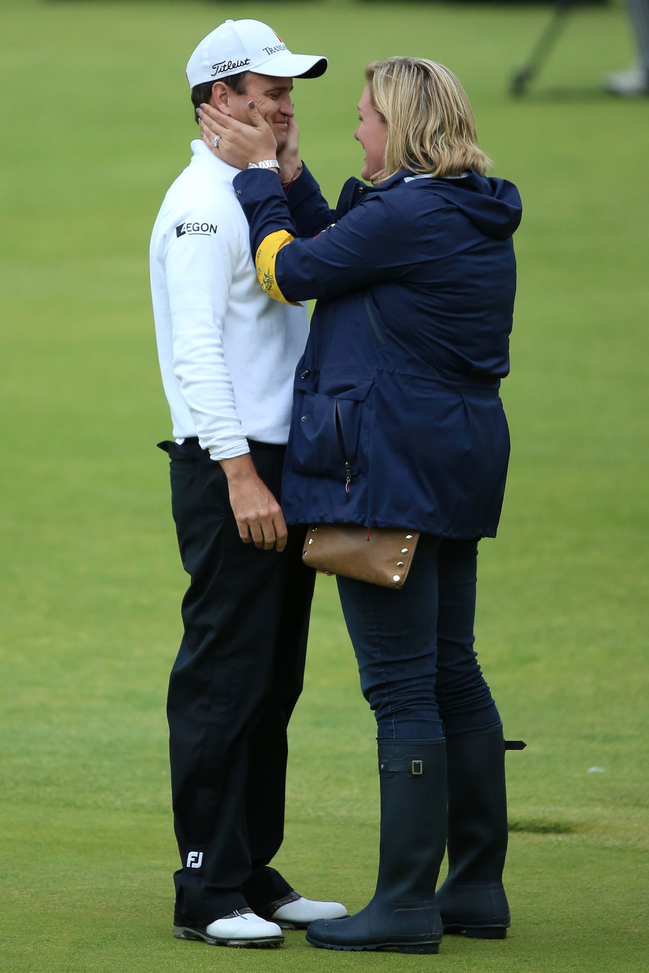 Zach Johnson celebrates with his wife Kim after winning the 144th Open Championship at St. Andrews' Old Course.