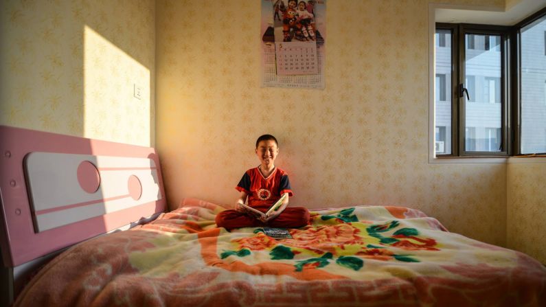 "I asked this boy the show me his most prized possessions and he brought out some books that were given by President Kim Jong-un," says Pan. Slowly gaining the trust from local officials, Pan has vistied the country six times and is allowed in places rarely seen before.