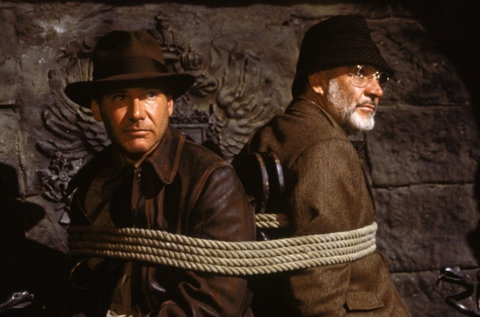 In 1989's "Indiana Jones and the Last Crusade," the third movie in the series, Harrison Ford's archaeologist/playboy/Nazi-fighter meets up with his father and realizes the proverbial apple doesn't fall too far from the tree (and viewers learn that Indy named himself after the family dog).