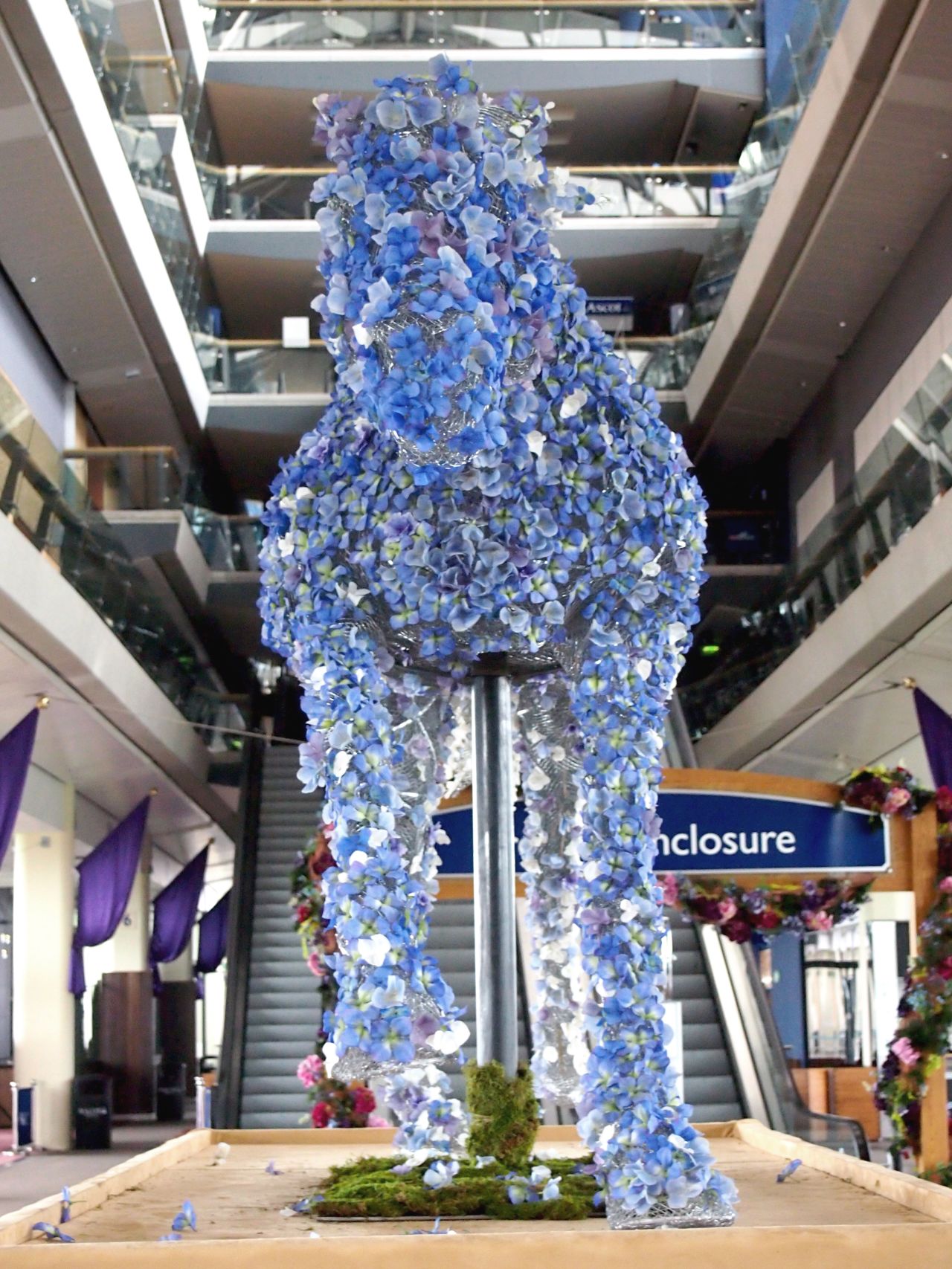 The Ascot sculpture was then festooned with flowers. 